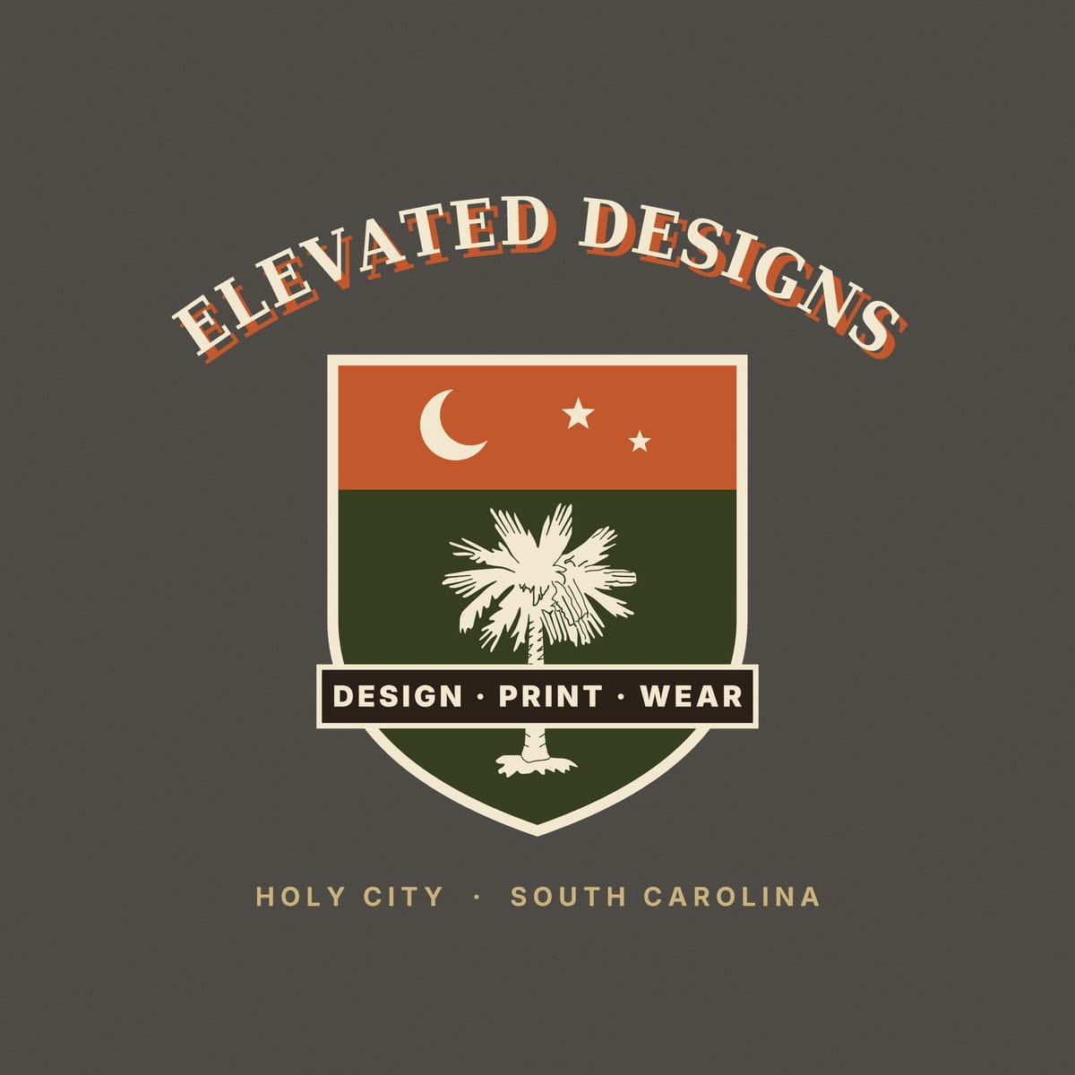 Close-up of the Shield print: a cream-edged shield with a rust band, crescent moon and stars over an olive field with a cream palmetto and dark banner.